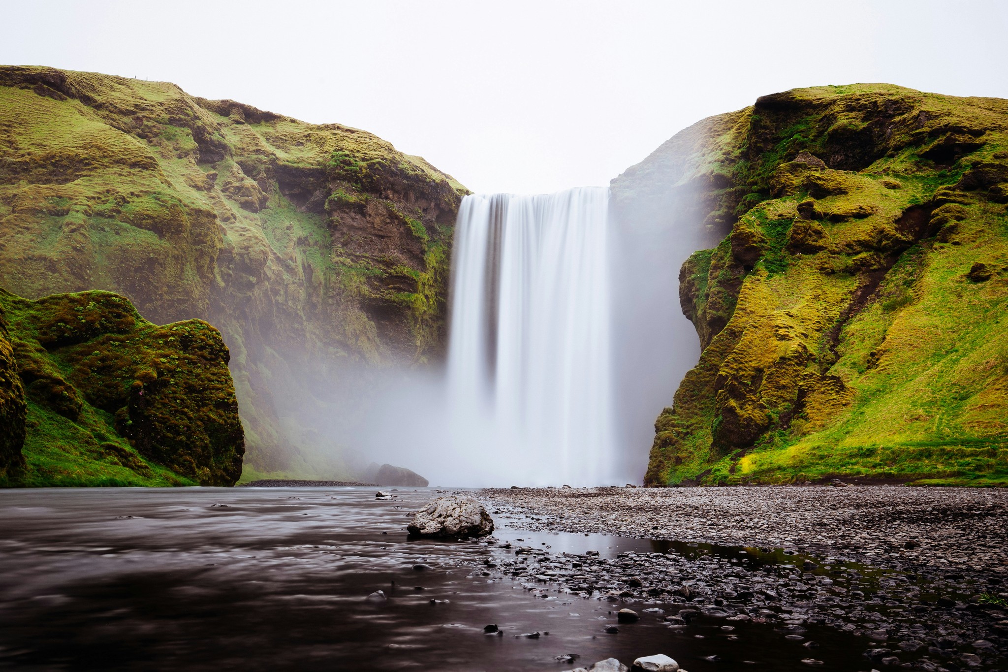 Steam rising from the base of Skógafoss Waterfall in South Iceland.