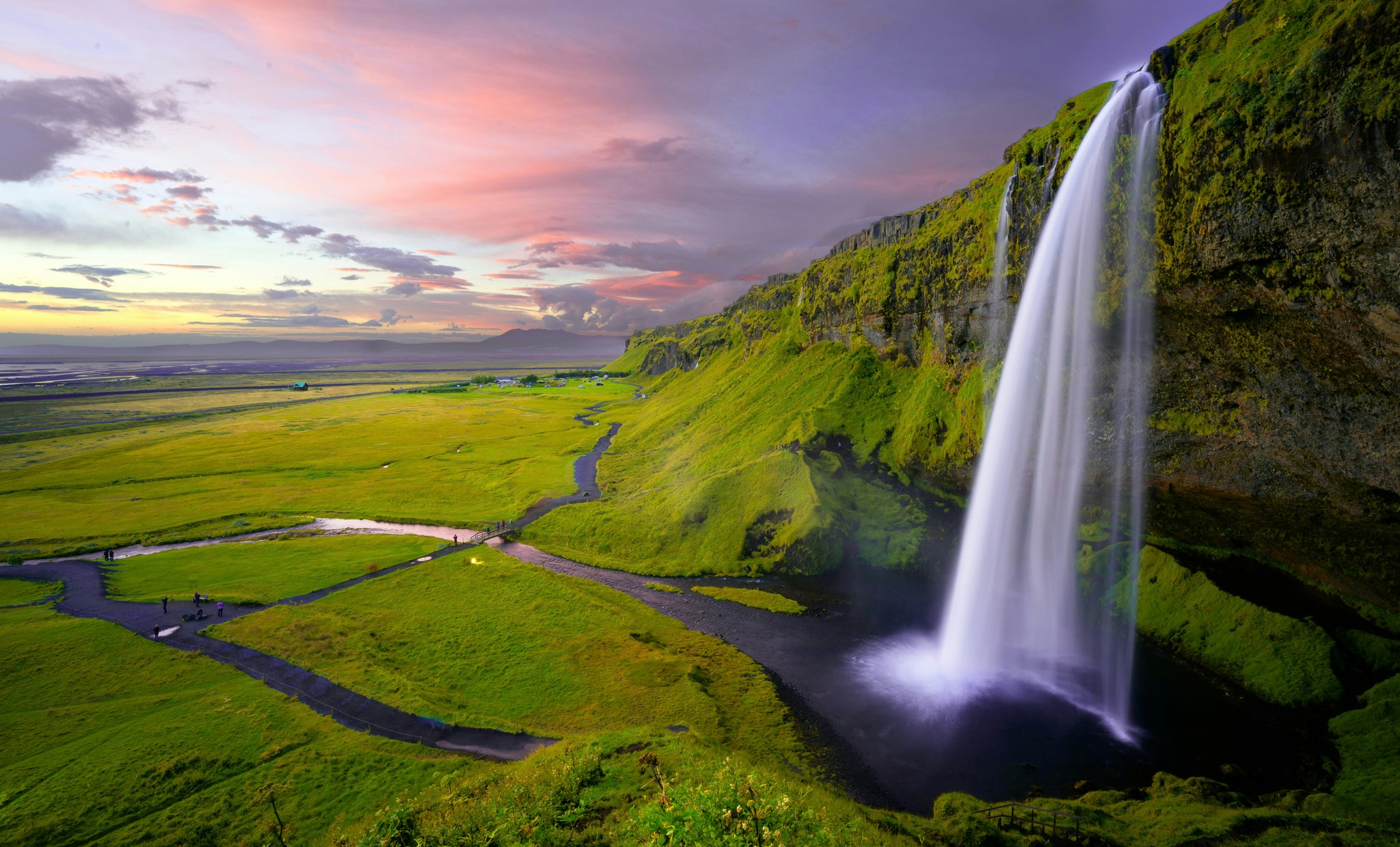 Seljalandsfoss cascading over a cliff in South Iceland.