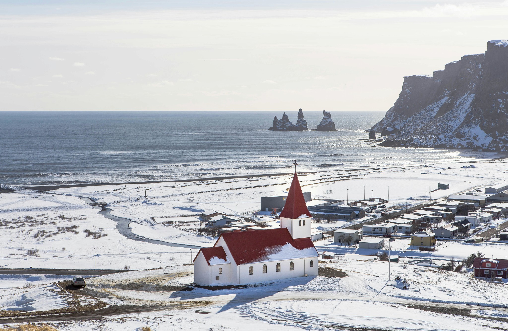 Town of Vík í Mýrdal in Iceland blanketed in snow.