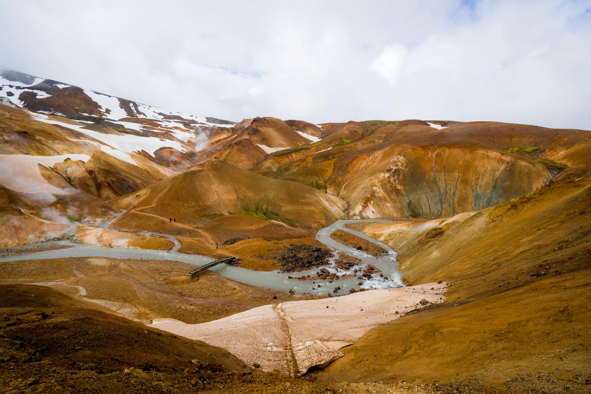 A river cutting through the Hveradalir Geothermal Area in Ölfus.